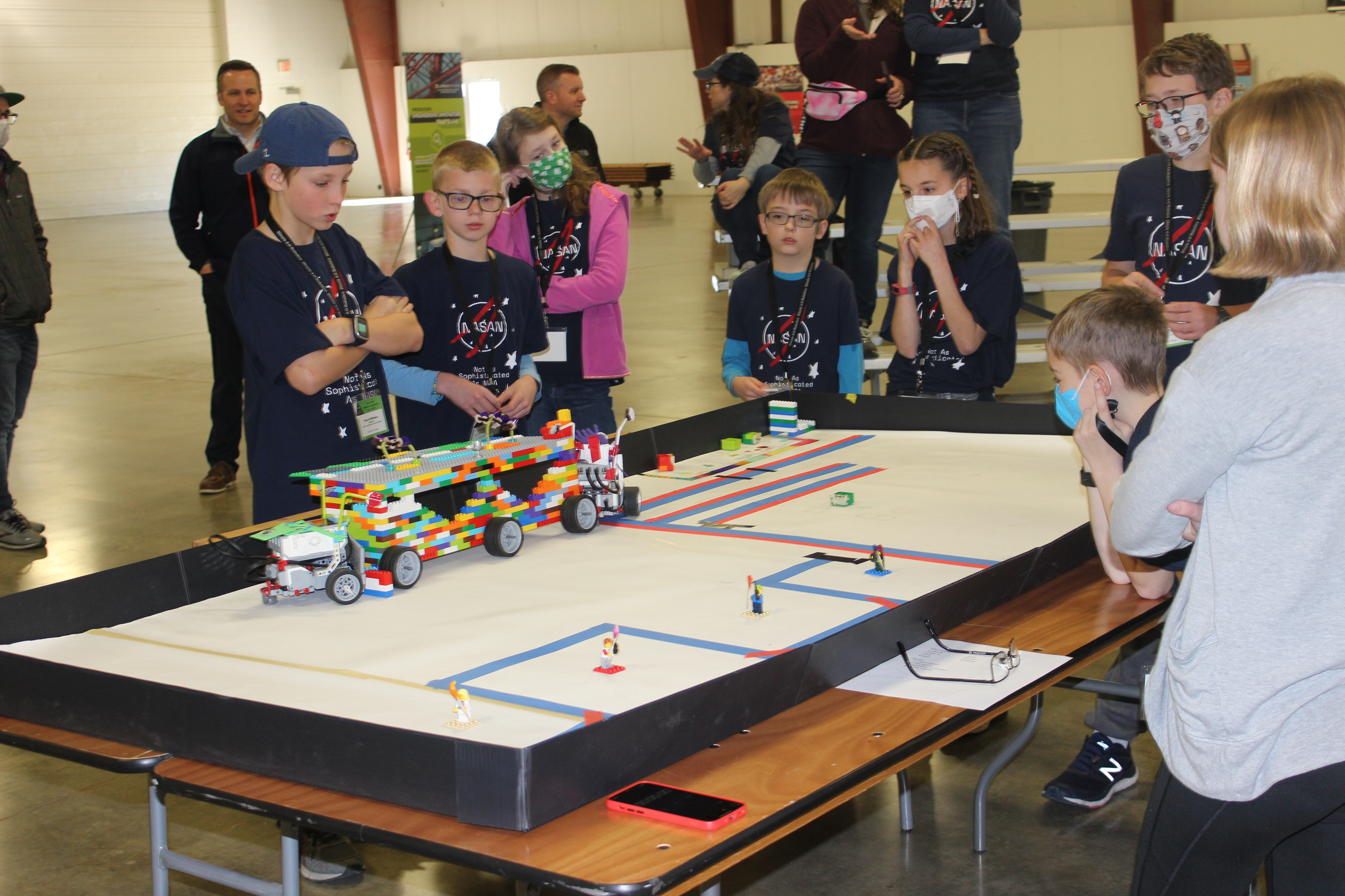 youth at a robotics table