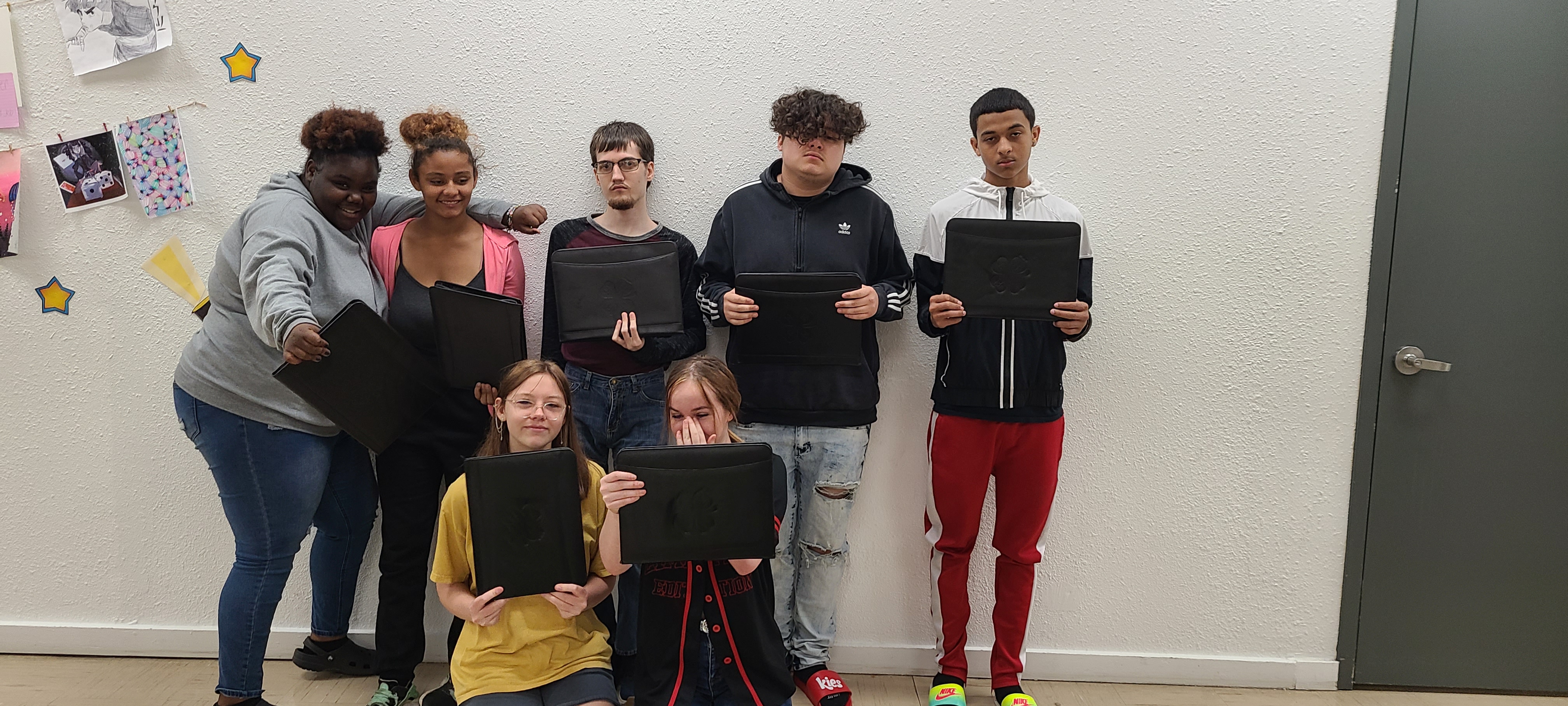 youth hold certificates