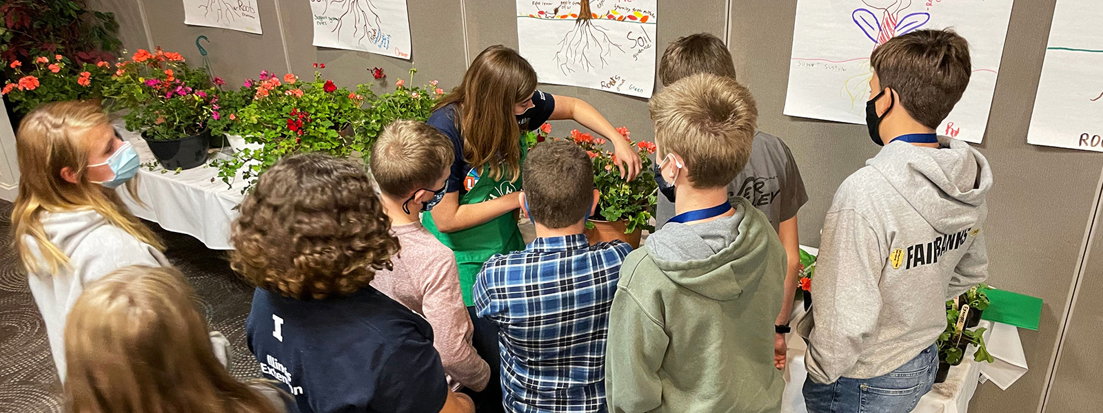 Kids learning about plants at leadership conference