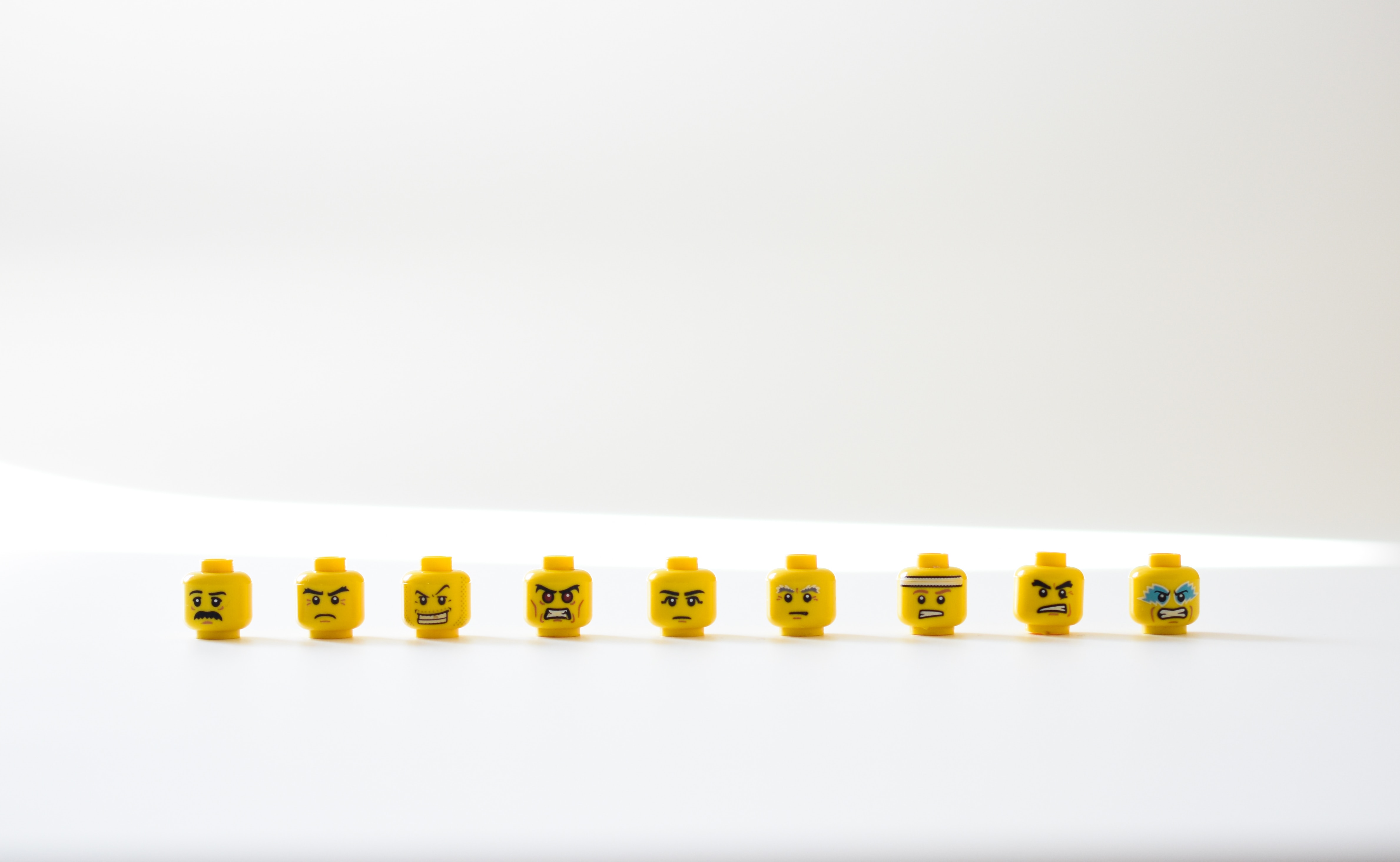 lego heads showing various emotions