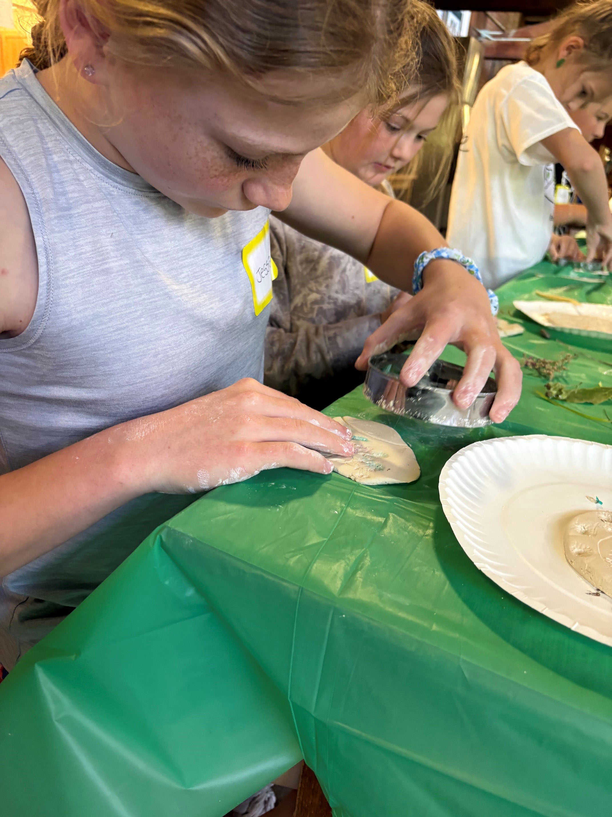 Youth working with clay