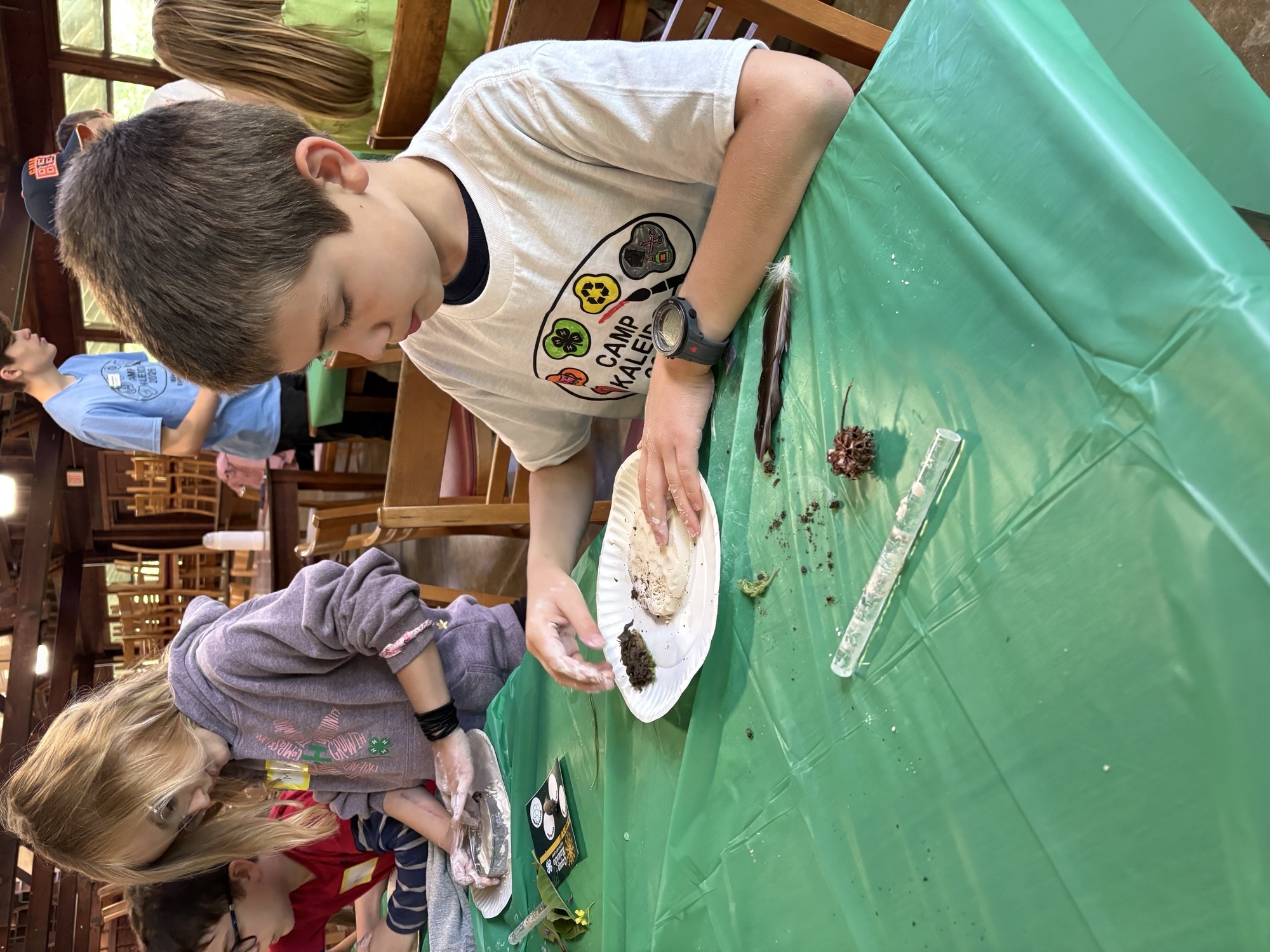 Youth working with clay