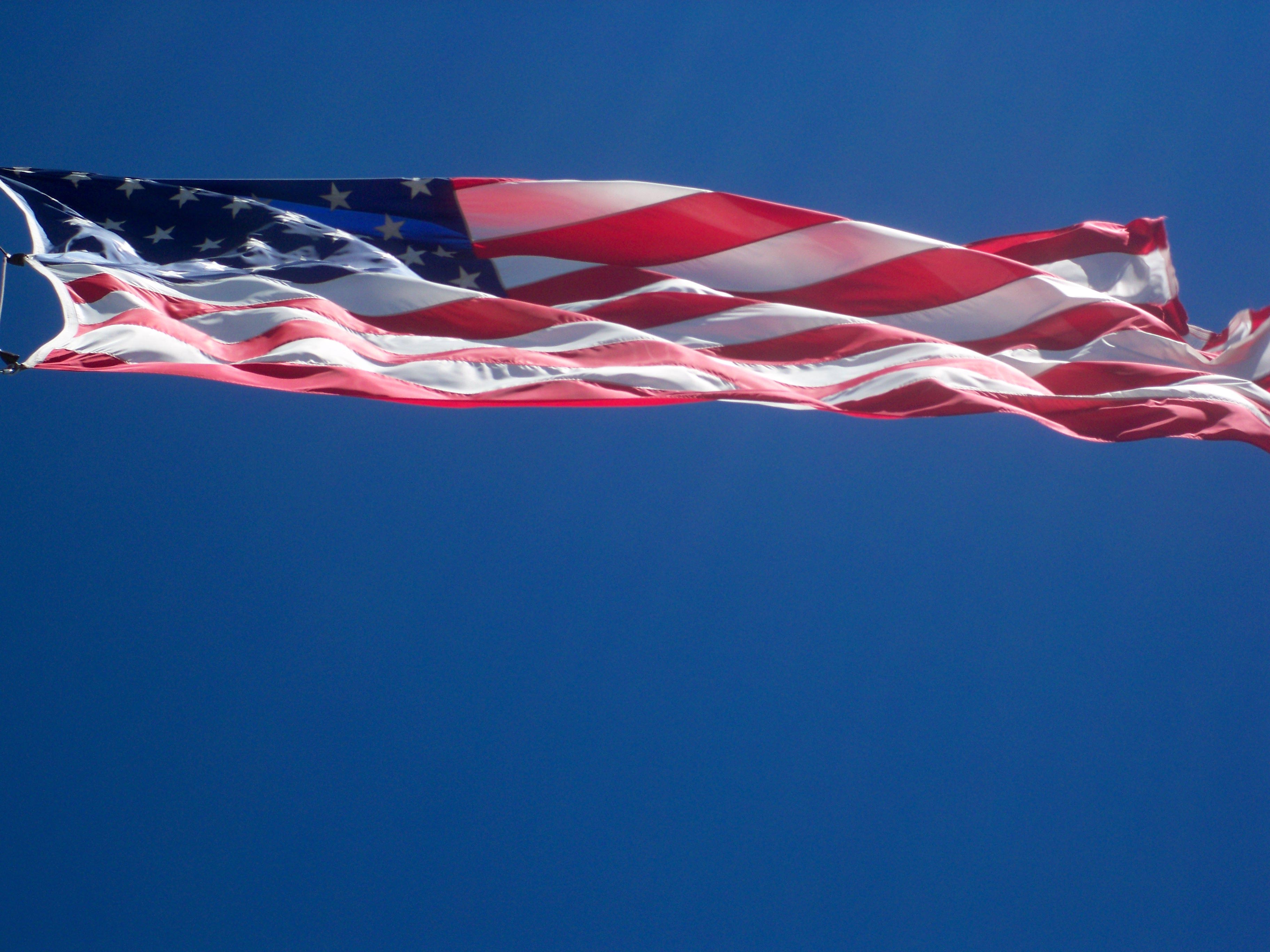 Citizenship - flag blowing in wind