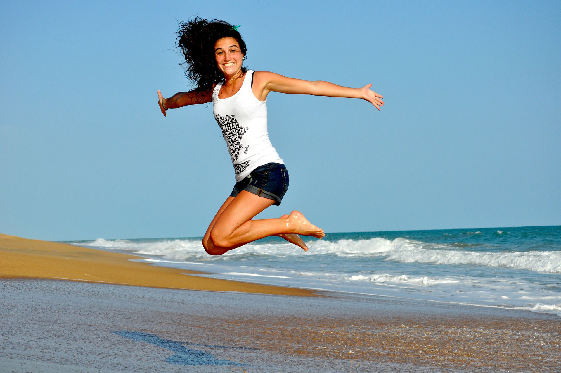 girl jumping and smiling