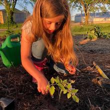 girl working in a garden