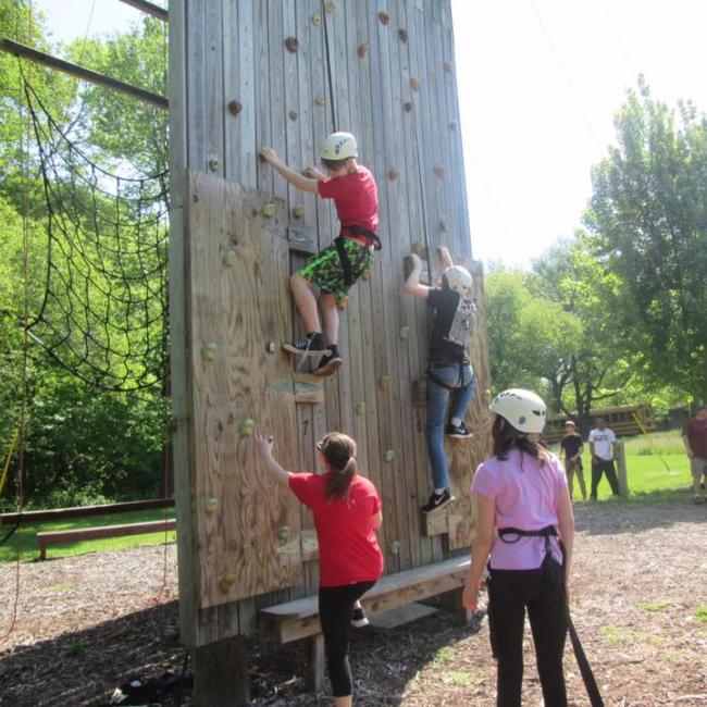 people on ropes course