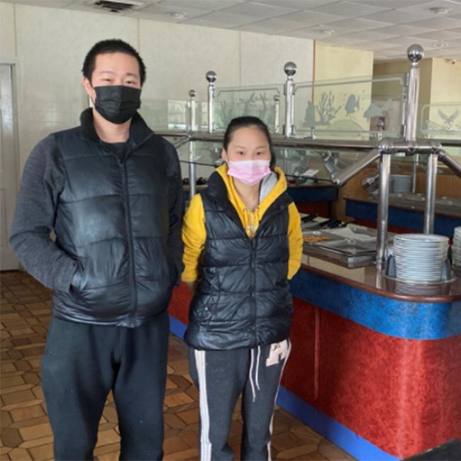 Business owners of restaurant