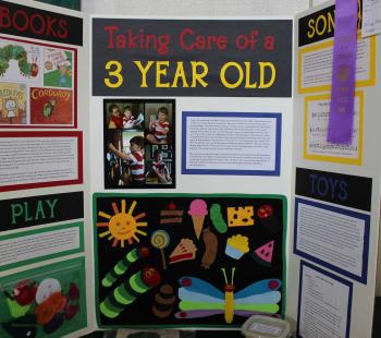 Exhibit board for the child development project on taking care of a 3 year old