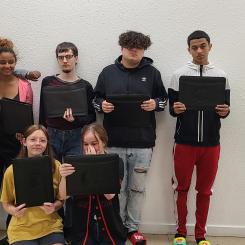 youth hold certificates