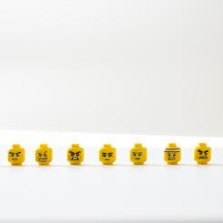 lego heads showing various emotions